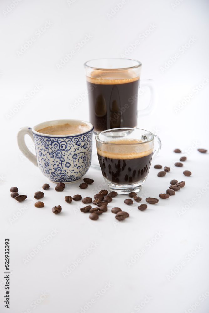 Small cup of coffee machine beans grains gourmet beverage waking up breakfast Small cup of coffee machine beans grains gourmet beverage waking up breakfast