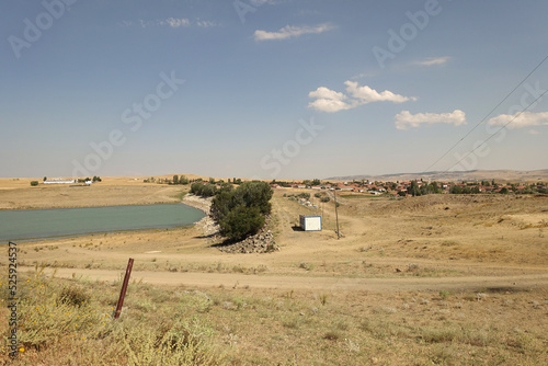 The irrigation dam of a village has lost a lot of water as a result of drought, the pond whose water has decreased, the tragic situation of the drought and irrigation pond,