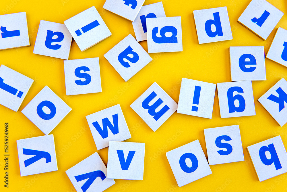 Letters of the alphabet on a yellow background, happy children's day. Letters of the alphabet on a yellow background, happy children's day.