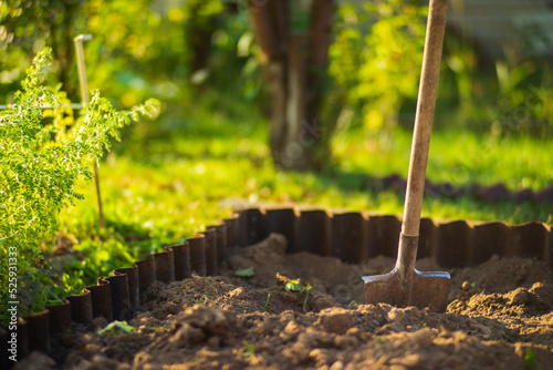 Farmer's garden tool - shovel. Gardening concept. Agricultural work on the plantation