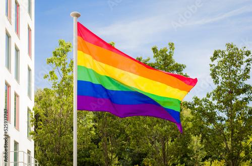 Gay pride flag (rainbow flag) flying on flagpole, Bournemouth UK