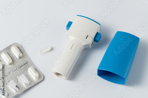 Inhaler or bronchodilator and medical powder capsules for prevention and treatment of bronchitis or asthma. photo