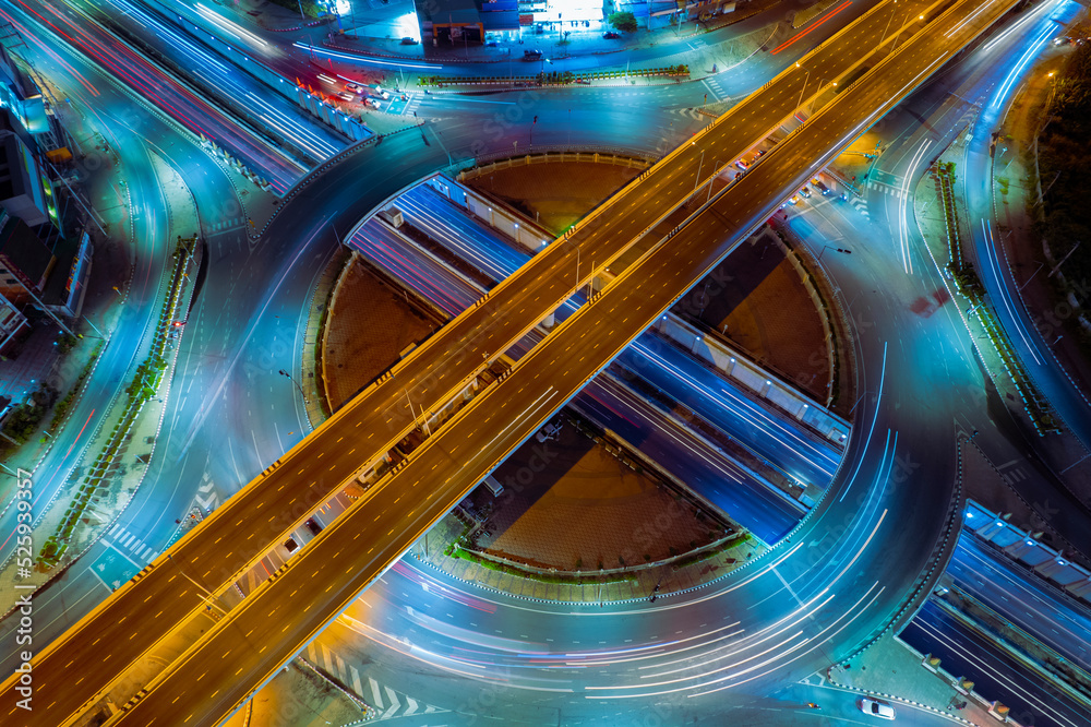 Expressway top view, Road traffic an important infrastructure,car traffic transportation above intersection road in city night, aerial view cityscape of advanced innovation, financial technology	
