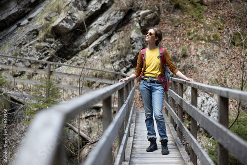 Female Tourist Enjoying Trails over Gorges and Ravines of Slovenian Alps
