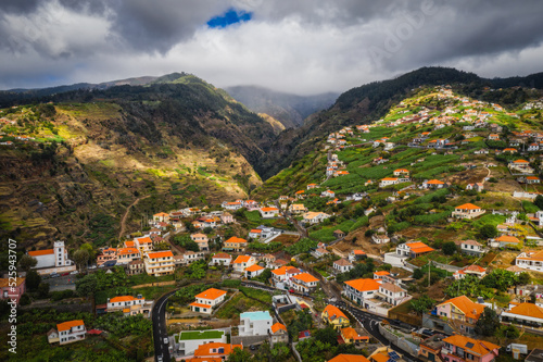 Panoramic view from Ponta do Sol village on Madeira island, Madeira, Portugal. October 2021. Long exposure picture. photo