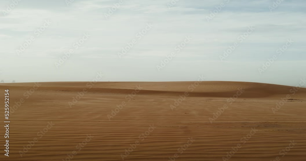 The wind blows the sands of the desert, forming a beautiful sand pattern. Desert sand dunes, vertical video. 4k video, red komodo The wind blows the sands of the desert, forming a beautiful sand pattern. Desert sand dunes, vertical video. 4k video, red komodo