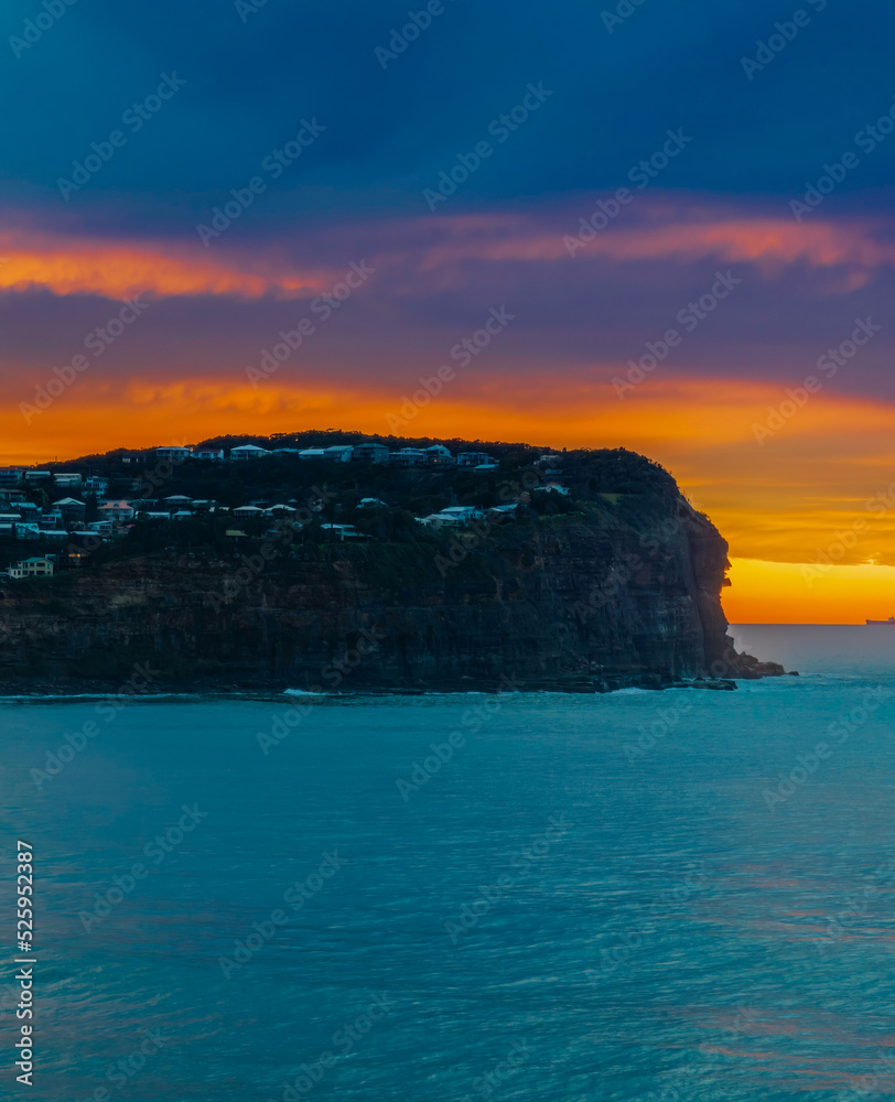 Cloud filled sunrise seascape