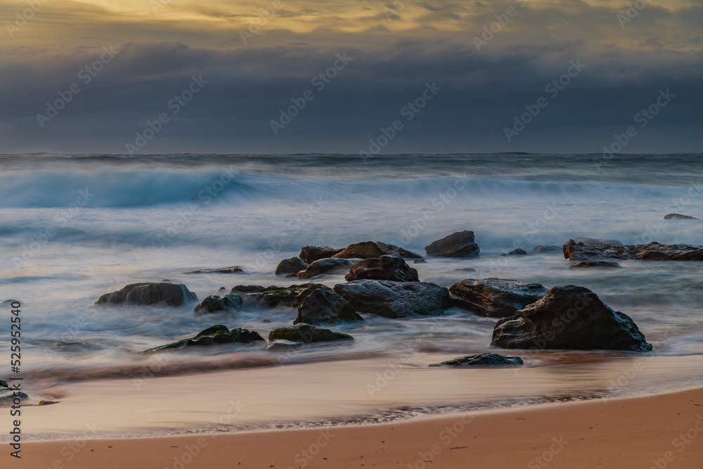 Cloud covered sunrise sesacape in soft pastel shades Cloud covered sunrise sesacape in soft pastel shades