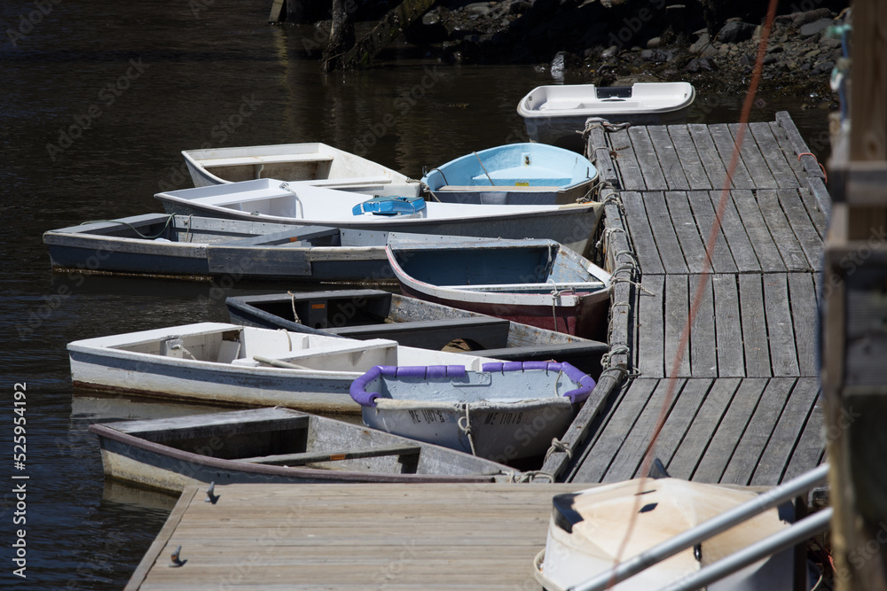 Rowboat moored at a dock