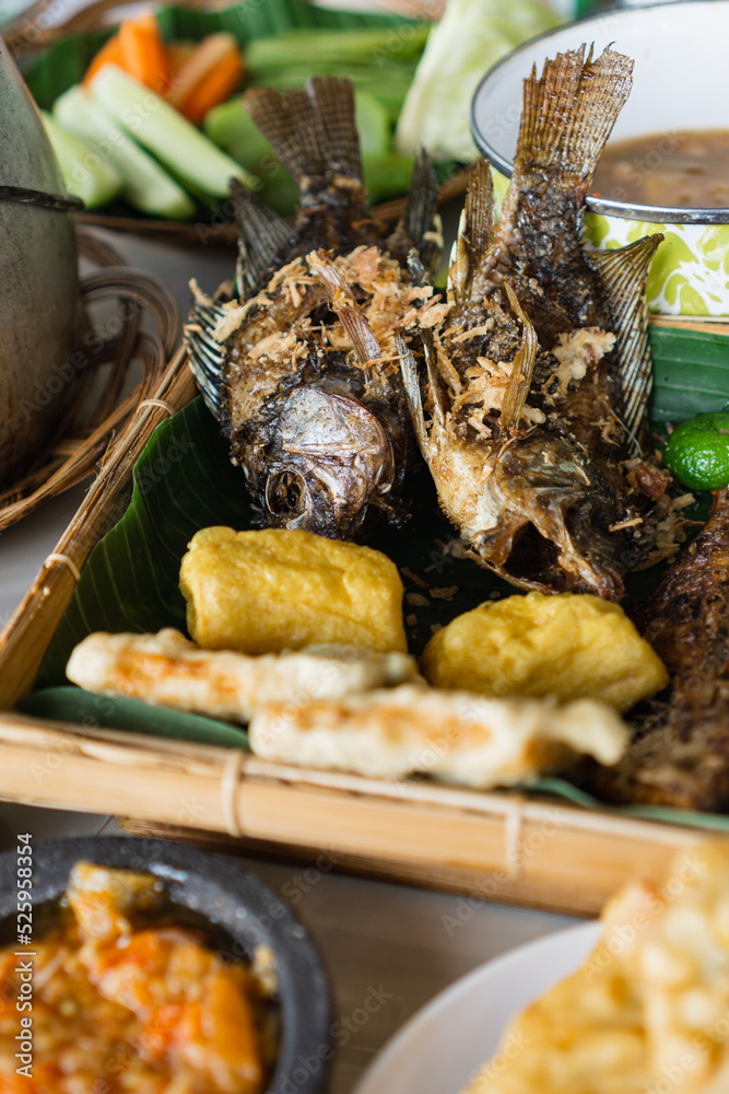"ikan nila goreng" fried tilapia fish, sundanese cuisine, serve with