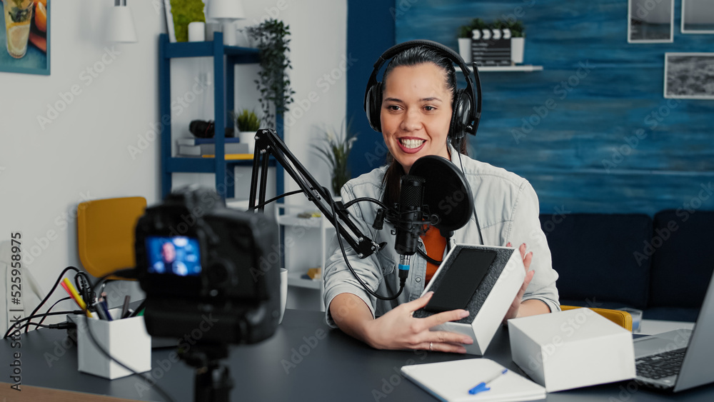Popular internet influencer doing unpacking video of modern smartphone ...