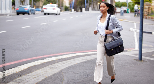Running, stress or late business woman in hurry with bag missing job interview, meeting or startup pitch idea in downtown city. Fear, anxiety or risk creative entrepreneur or designer moving in town photo