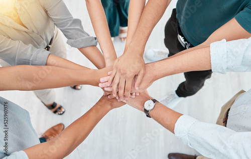 Support, trust and collaboration of business people pile hands together in agreement of partnership in an office. Teamwork, team building and celebrating company growth and diversity © Sanele Gobinduku/peopleimages.com