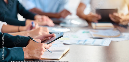 Business marketing meeting and manager with tablet searching the internet for teamwork in an office. Closeup hands of employee working on project management strategy with an online app in a boardroom