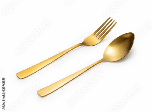 Gold spoons and forks placed on a white background.