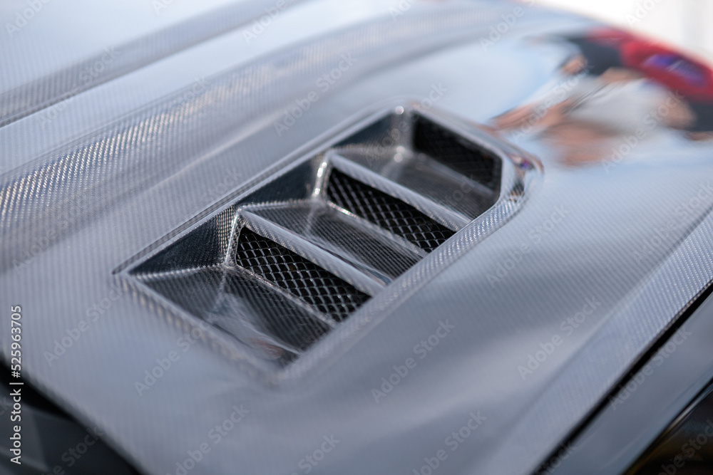 Luxury sports car fragment, aerodynamics carbon grille covers air intake system