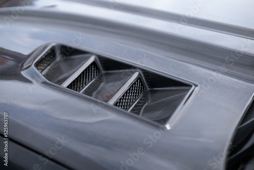 Luxury sports car fragment, aerodynamics carbon grille covers air intake system