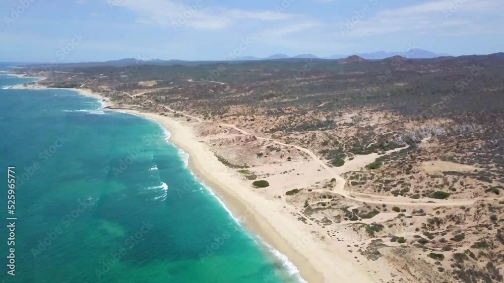 drone shot of a beautiful desert virgin beach in Cabo drone shot of a beautiful desert virgin beach in Cabo