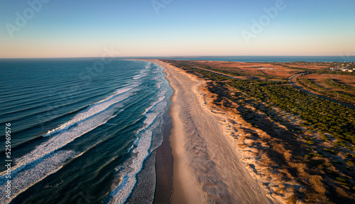 Aerial view of coastline and sand dunes of Ocracoke Island at sunrise, North Carolina, USA. 