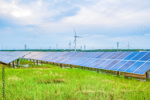 Aerial photography of an industrial park combining wind power generation, photovoltaic power generation and fish farming in Dongtai City, Yancheng City, Jiangsu Province, China