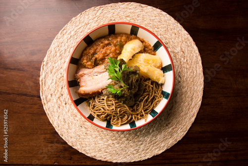 Sopa seca spaghetti carapulcra and yuca Peruvian comfort restaurant gourmet food photo