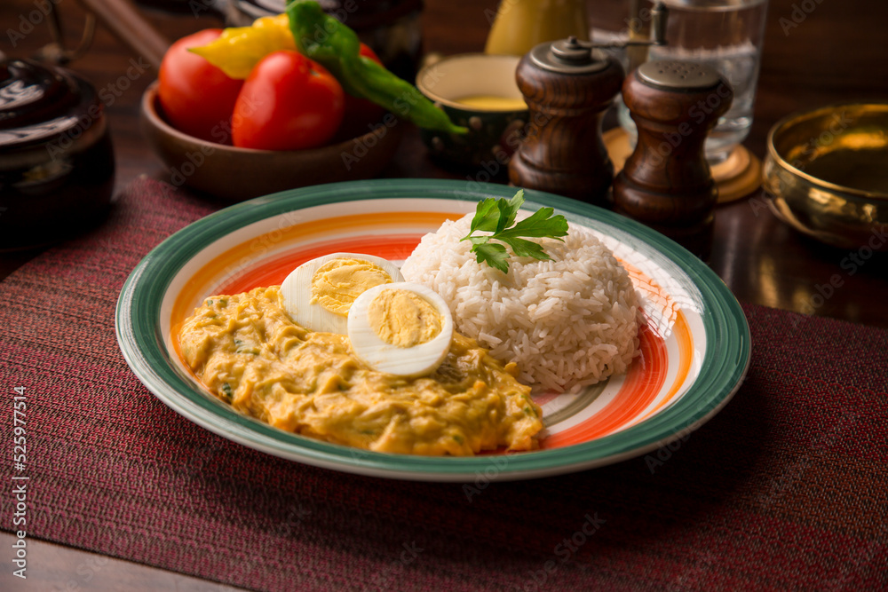 Aji de gallina chicken cream boiled eggs Peruvian comfort restaurant gourmet food