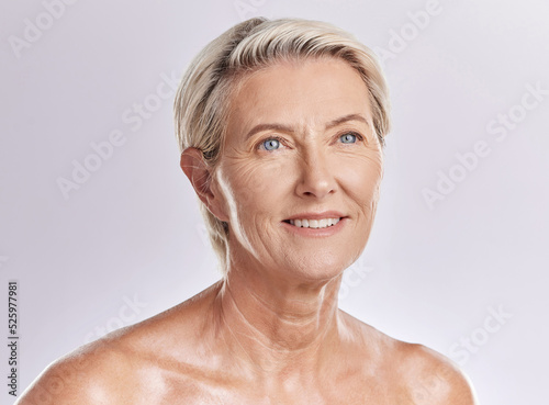 Skincare  beauty and wellness in retirement  a senior woman isolated against a pink background in a studio. Happy elderly female with a good skin care and healthy routine is self care for your face.