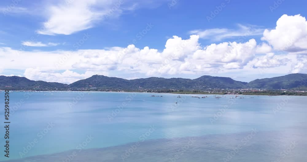Landscape view lake and mountains in the background. Blue sea waves and sky clouds sunny. Landscape view lake and mountains in the background. Blue sea waves and sky clouds sunny.