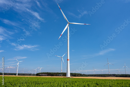 Wallpaper Mural Wind energy plants in front of a blue sky in Germany Torontodigital.ca