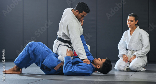 Photos Karate student exercise, learning and training with mma coach teaching, sports and workout at gym