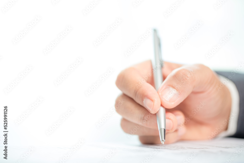Workplace closeup person professional businesswoman sitting at desk hold pen signing or signature contract paper. Employee woman writing agreement document on paperwork form corporate at work office Workplace closeup person professional businesswoman sitting at desk hold pen signing or signature contract paper. Employee woman writing agreement document on paperwork form corporate at work office