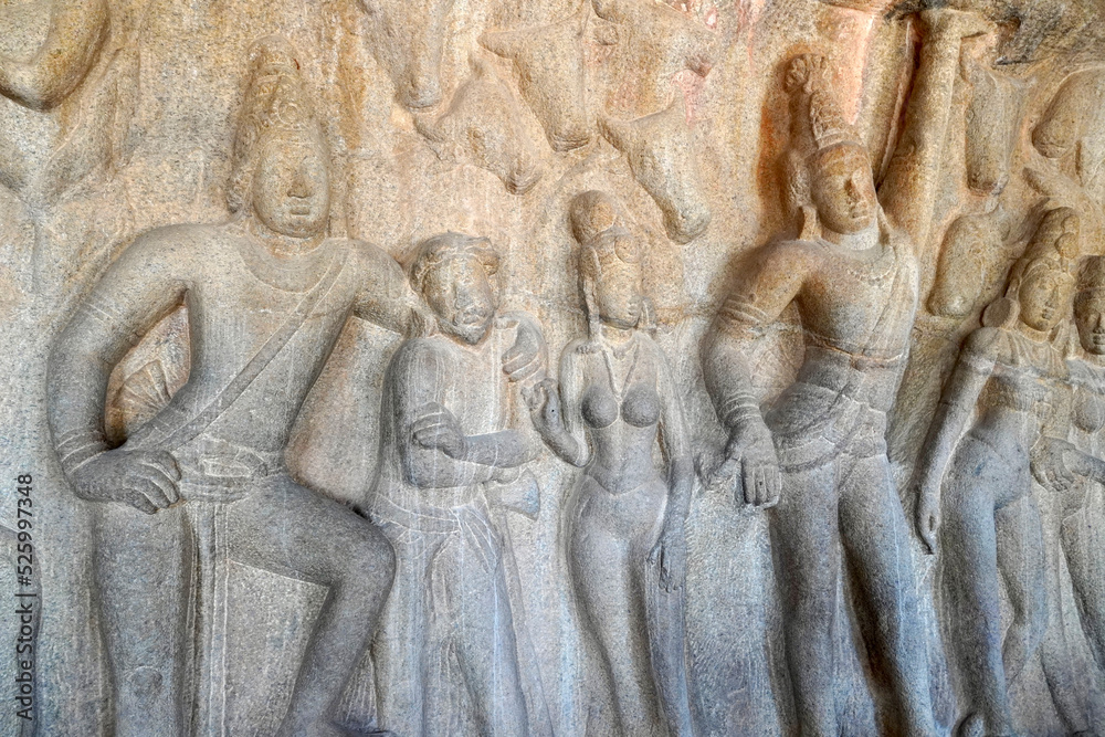 Indian rock art of bas relief sculptures of God, Animals carved in the monolithic rock cut cave temples in Mahabalipuram, Tamilnadu, India. Ancient historical relief sculptures in Tamilnadu.