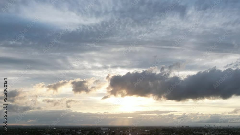 A hyperlapse of fast rolling storm clouds during a sunset A hyperlapse of fast rolling storm clouds during a sunset