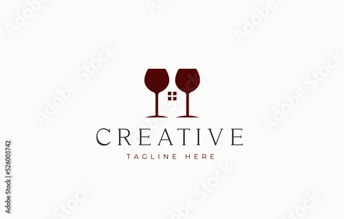 Wine Bar Logo. Two Glasses of Wine that resemble a house