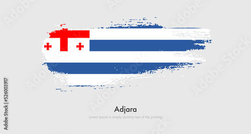 Brush painted grunge flag of Adjara. Abstract dry brush flag on isolated background