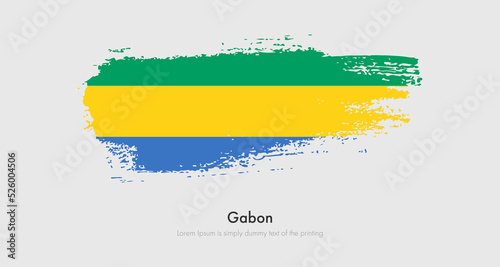 Brush painted grunge flag of Gabon. Abstract dry brush flag on isolated background