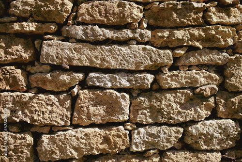 Wall of old stone bricks as an abstract background.