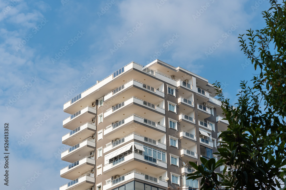 Low angle view of an apartment building with balconies. Low angle view of an apartment building with balconies.