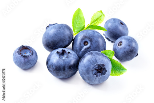Blueberry isolated on white background. Closeup group of fresh ripe blueberries with leaves.