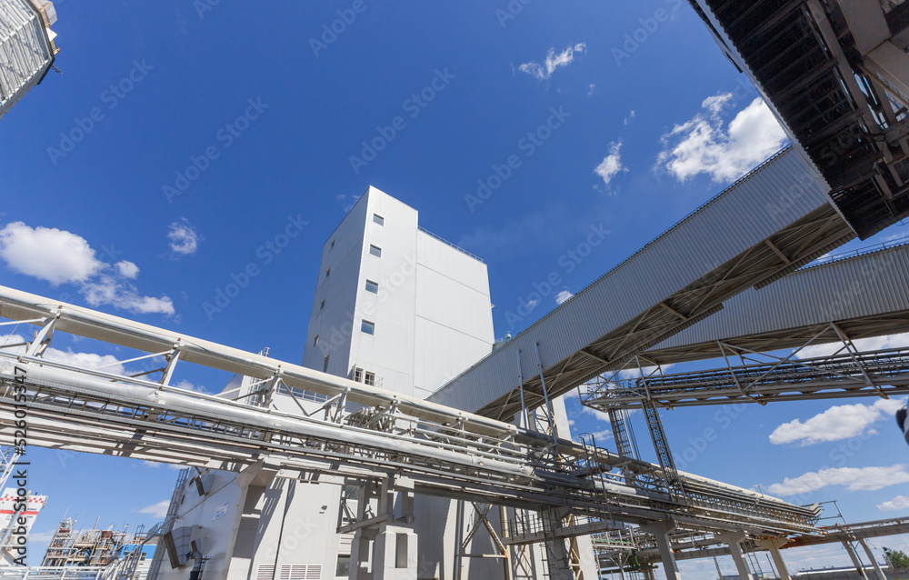 Summer view of big chemical plant. Summer view of big chemical plant.