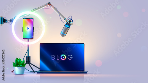 Blogger workplace. Streamer table with laptop, microphone, phone, led ring lamp on tripod, neon. Bright room of internet blogger in white colors. Home studio of stream video in social networking.