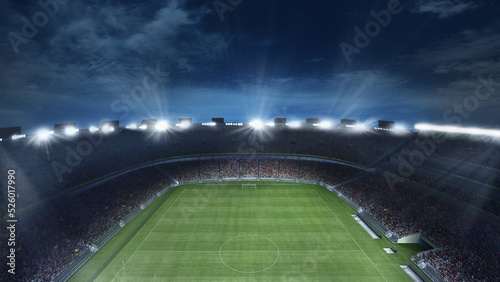 Empty football field with flashlights and dark night sky background. Stadium with filled stands with sports soccer fans.