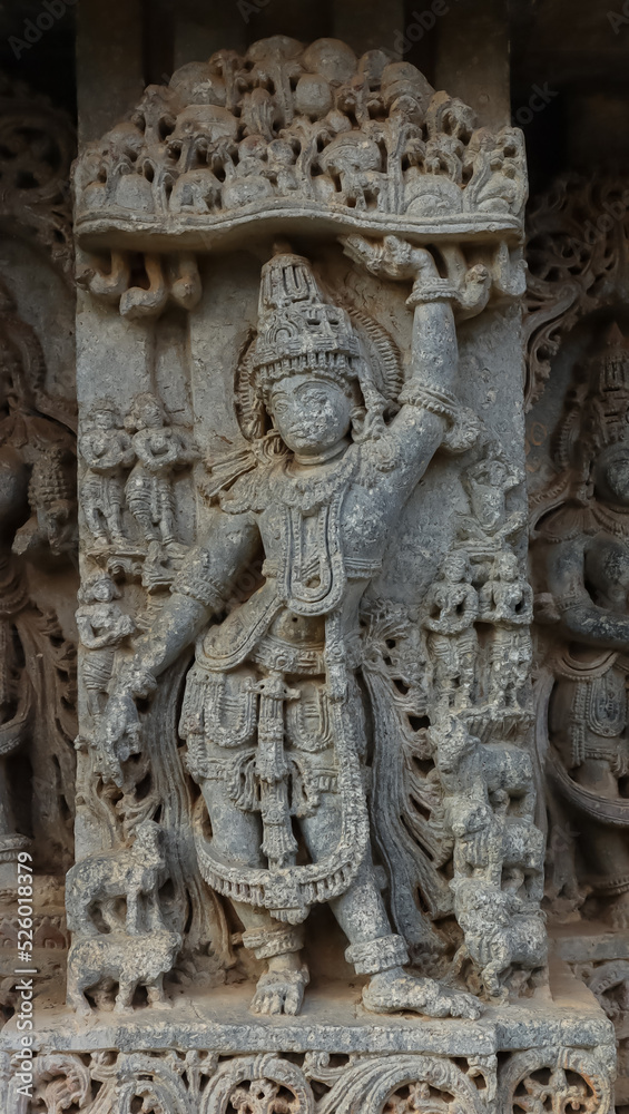 The Beautiful Sculpture of Lord Krishna Holding a Mountain, Lakshminarsimha Temple, Javagal, Hassan, Karnataka, India.