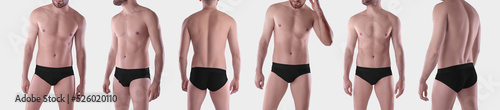 Fotografia Mockup of black swimming trunks on a man, brief male underpants, isolated on background