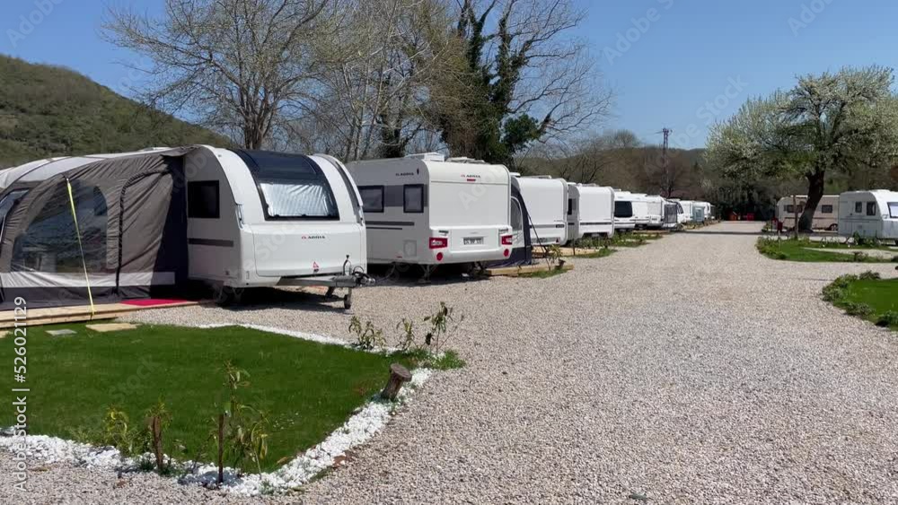 Caravans in a row in the campsite, Caravan Camping Site In Nature, Travel Trailers in the Camping ground. Agva, Turkey. Caravans in a row in the campsite, Caravan Camping Site In Nature, Travel Trailers in the Camping ground. Agva, Turkey.