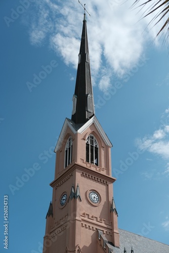 Vertical under view of a Mikkeli cathedral with blue sky in the background photo