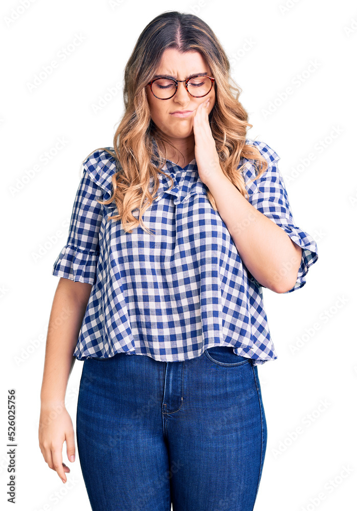 Young caucasian woman wearing casual clothes touching mouth with hand with painful expression because of toothache or dental illness on teeth. dentist Young caucasian woman wearing casual clothes touching mouth with hand with painful expression because of toothache or dental illness on teeth. dentist