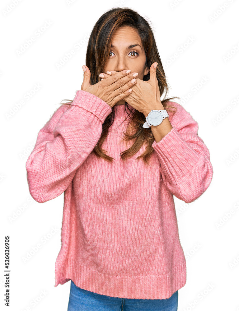 Young hispanic woman wearing casual clothes shocked covering mouth with hands for mistake. secret concept. Young hispanic woman wearing casual clothes shocked covering mouth with hands for mistake. secret concept.