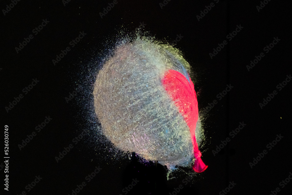 Water balloon popping liquid abstract art