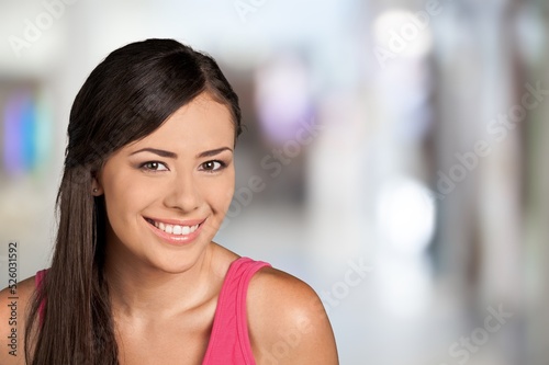 Perfect cosmetology skin care. A tender young woman with perfect face smiling and posing. Concept of beauty, health, ad